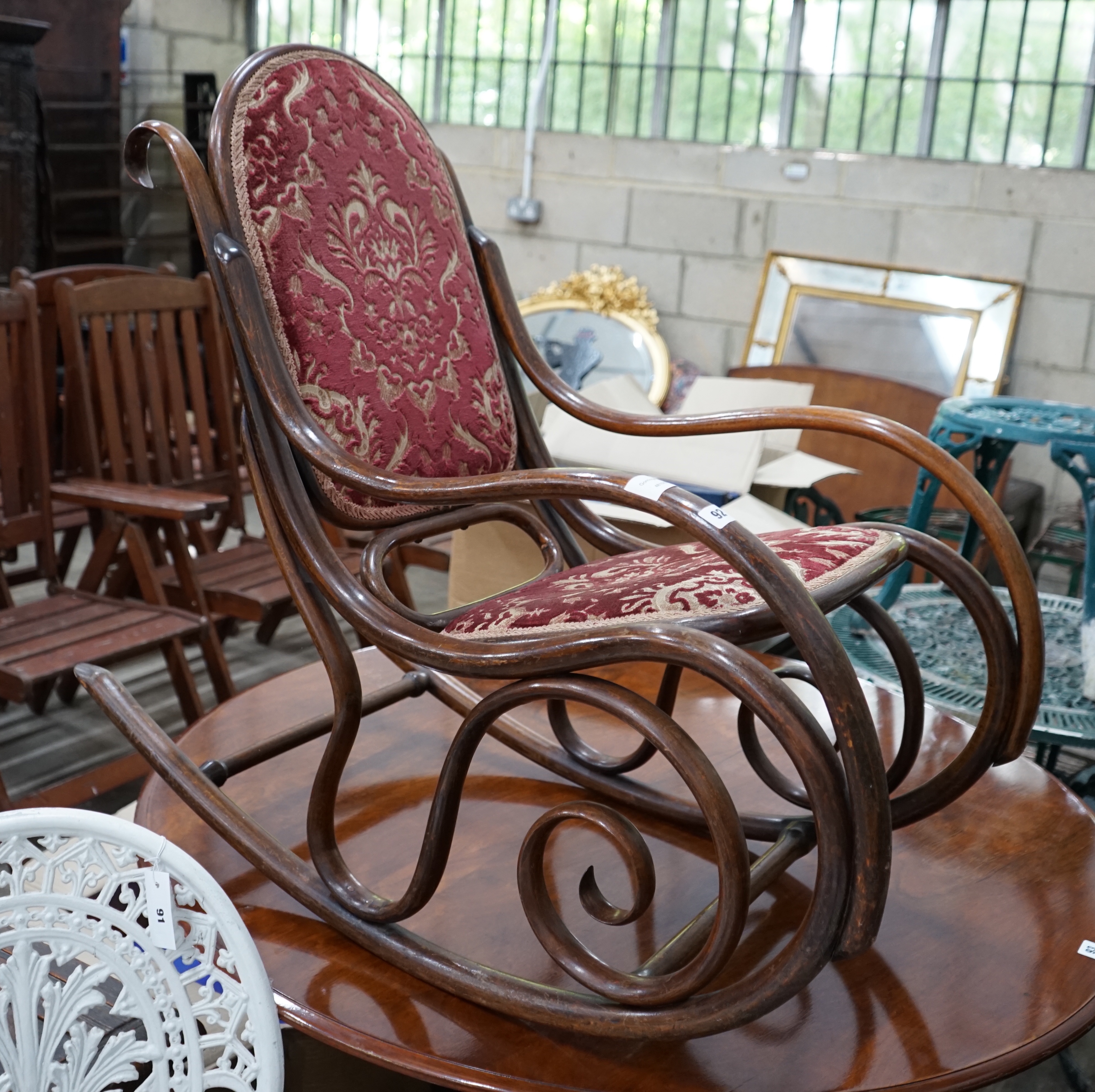 An early 20th century bentwood rocking chair